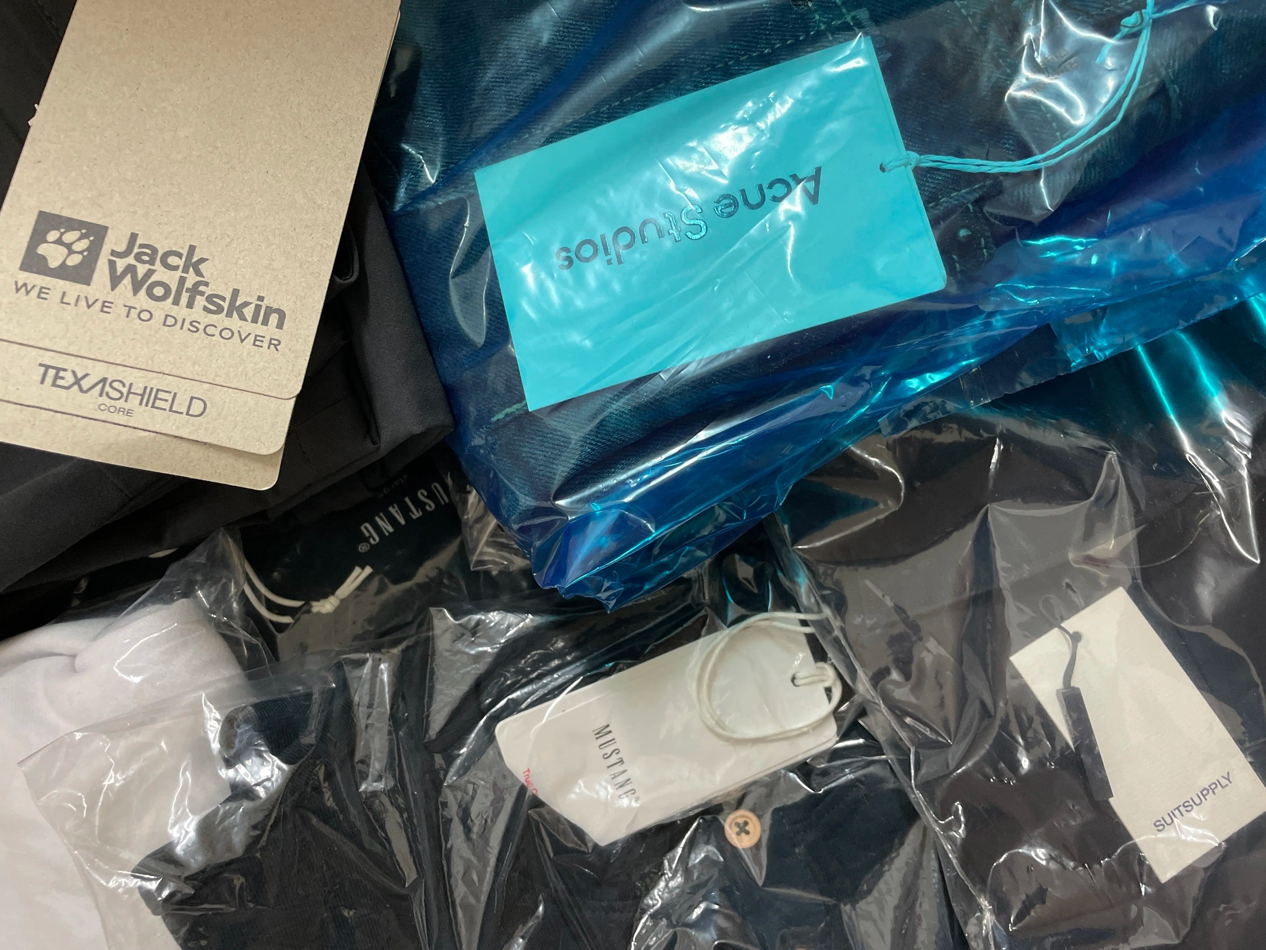 Acne Studios, Stussy & Mustang Clothing and more